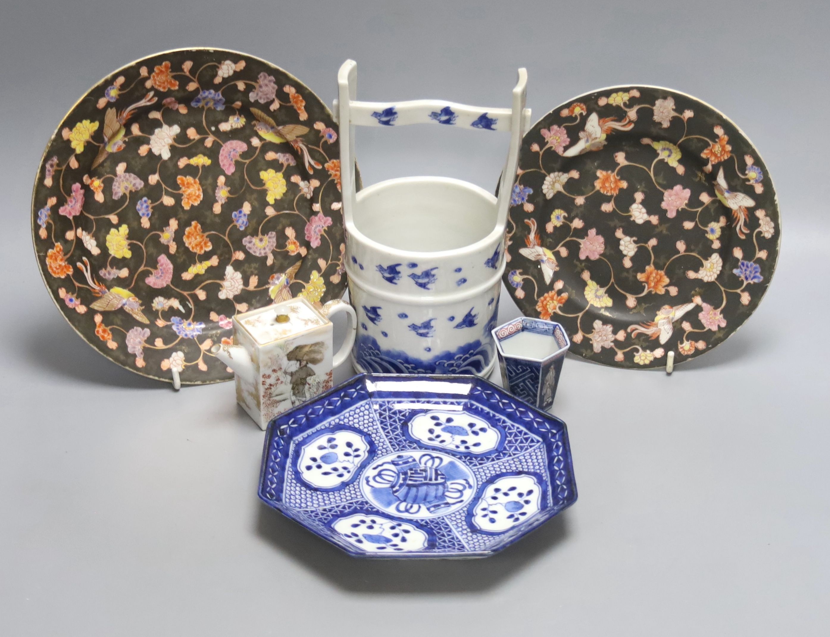 Two Fukagawa Koransha plates, a Kanzan Denshichi rectangular water dropper, a Japanese blue and white bucket and a dish, tallest 20cm